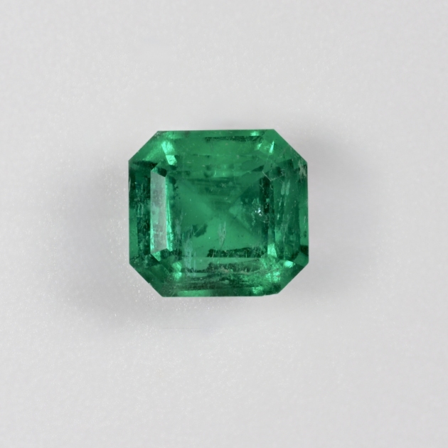 0.78 carat natural Panjshir emerald, front view on white background
