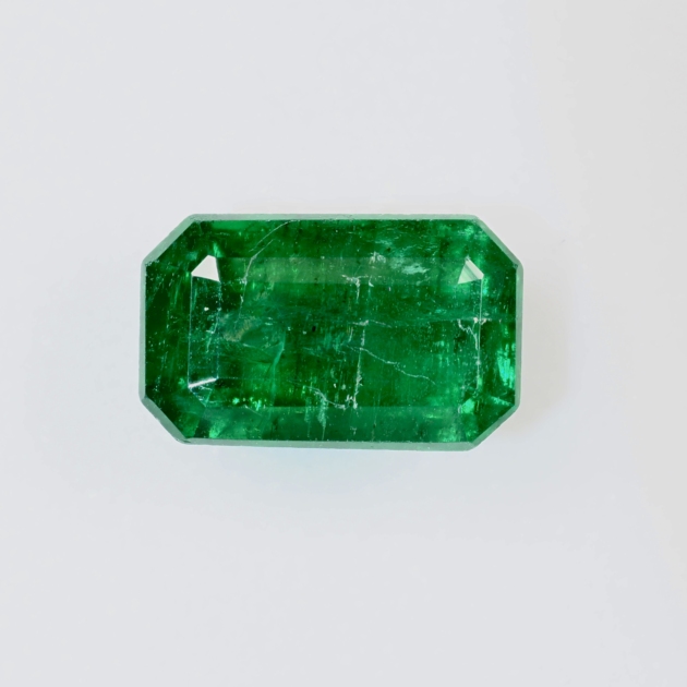 1.27 carat natural Zambian emerald, Guild Certified, front view on white background